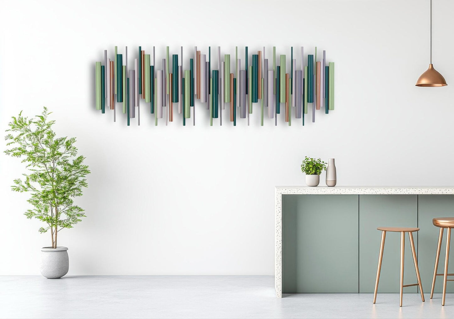 A modern wall-mounted art piece featuring multiple vertical wooden dowels in various muted colors including green, blue, brown, and gray, displayed on a white wall in a minimalist kitchen setting.