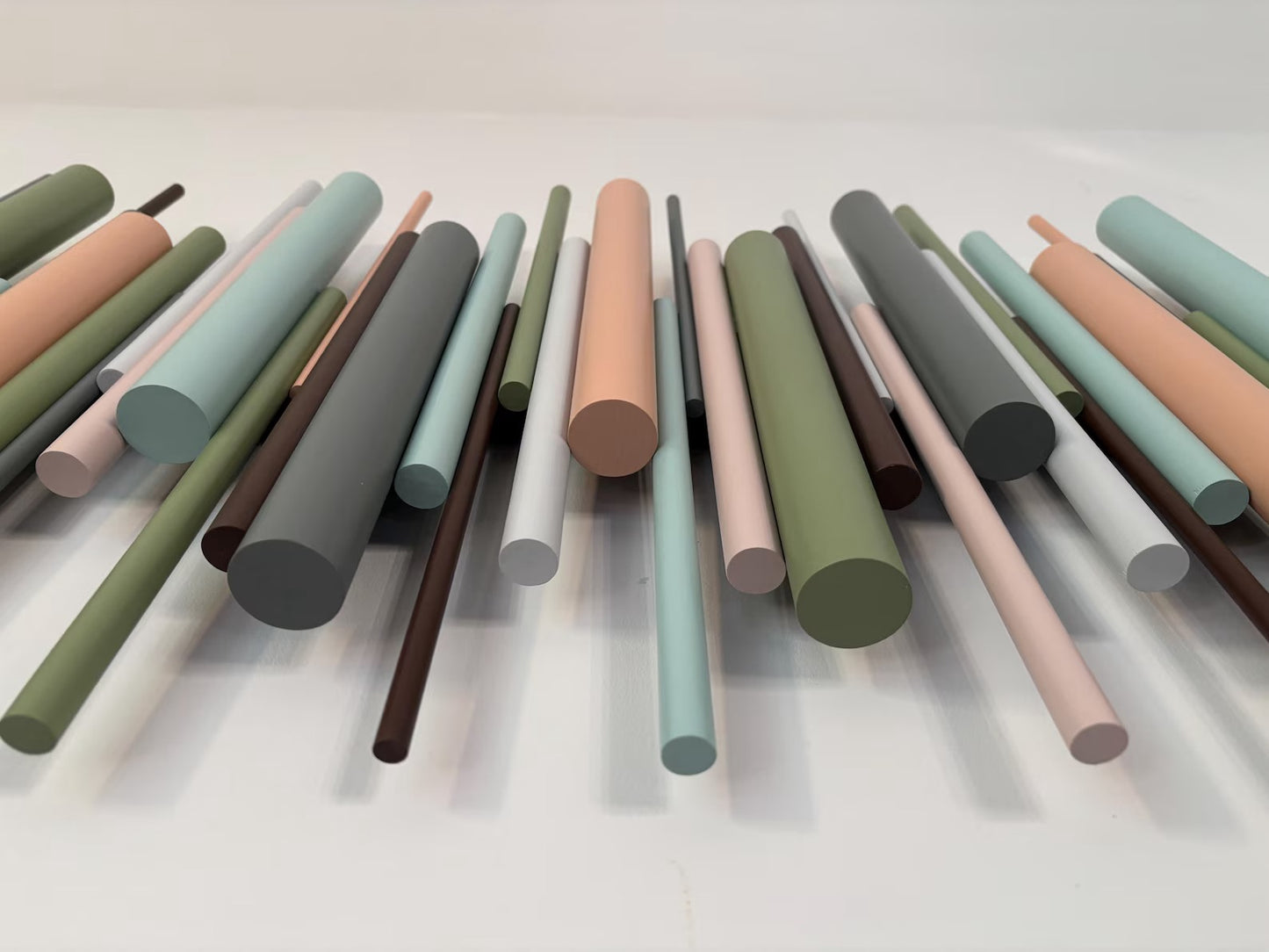 Close up of Terrain wood wall art showing painted wooden dowels – Berties Blocks