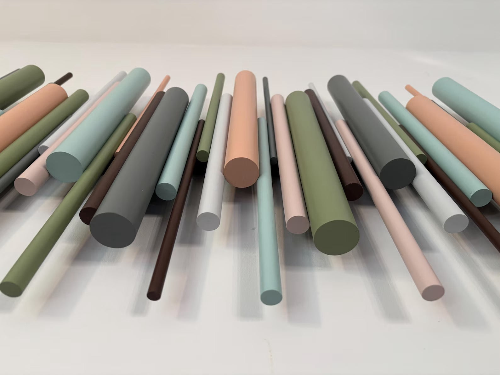 Close up of Terrain wood wall art showing painted wooden dowels – Berties Blocks